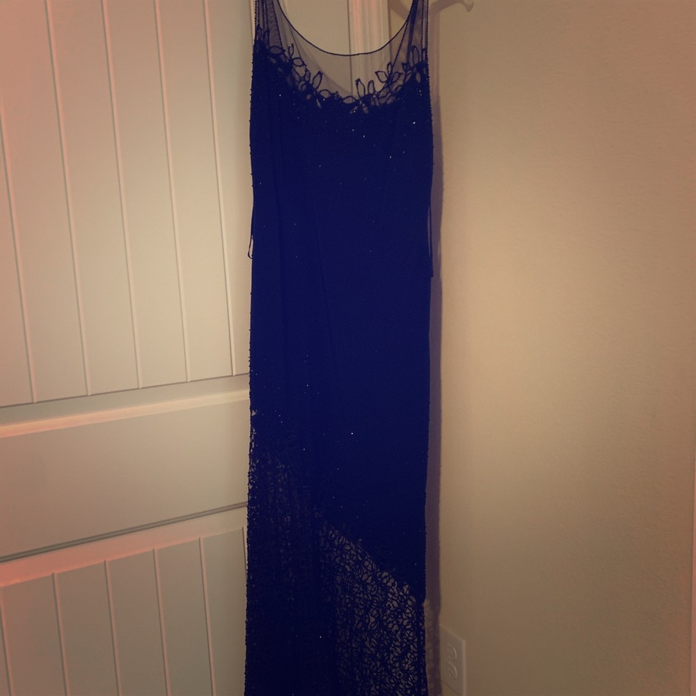 A long black beautiful dress for an evening event.